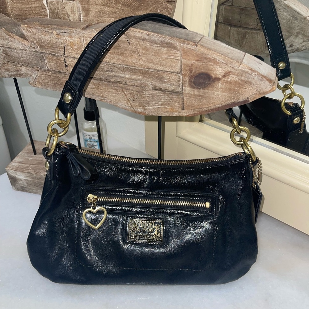 black and gold coach purse